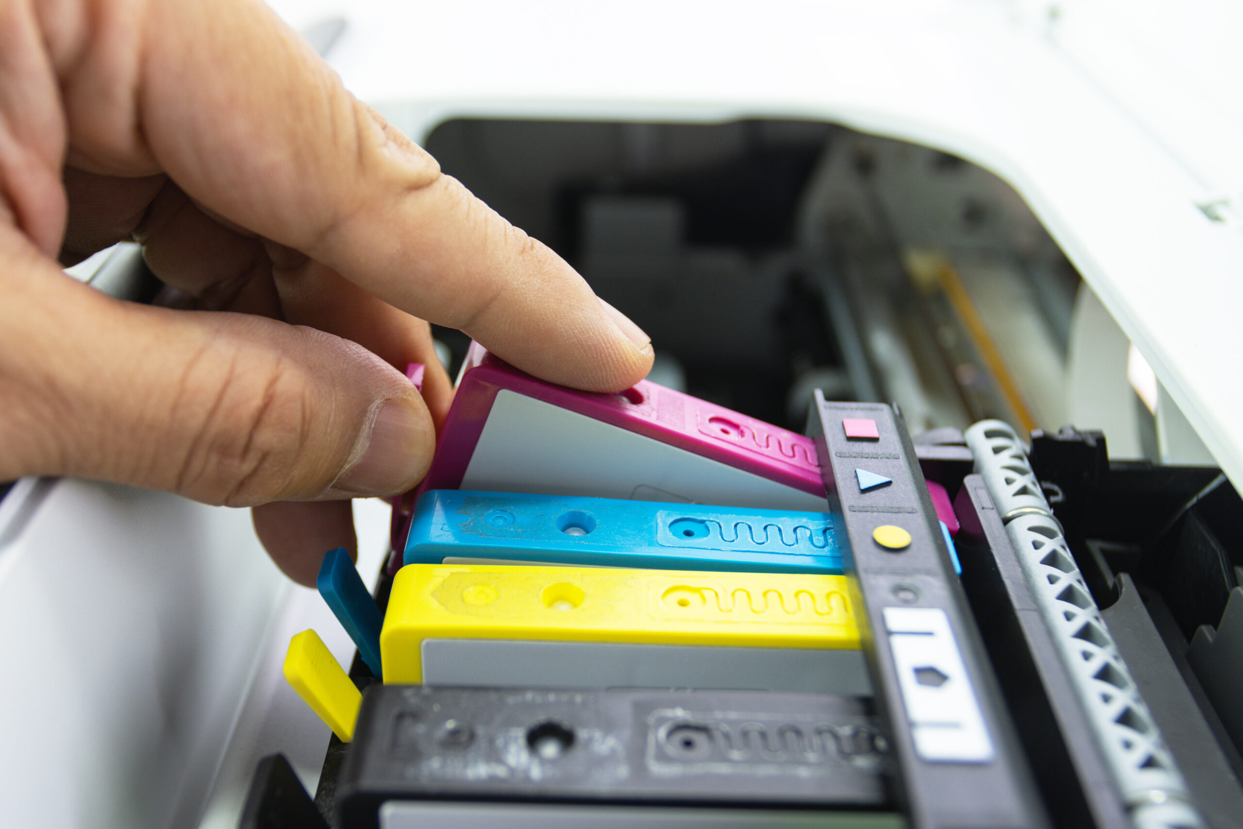 technicians are install setup the ink cartridge of a inkjet prin